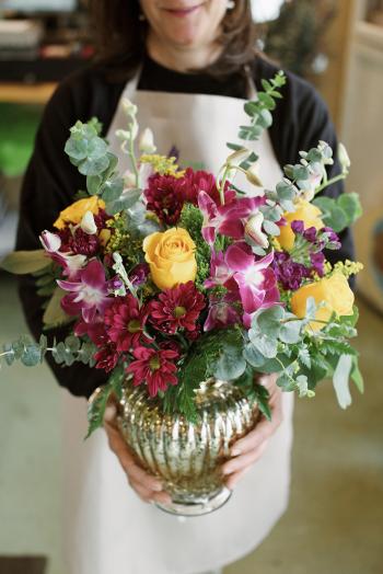 Florist Holding Flowers Close Up