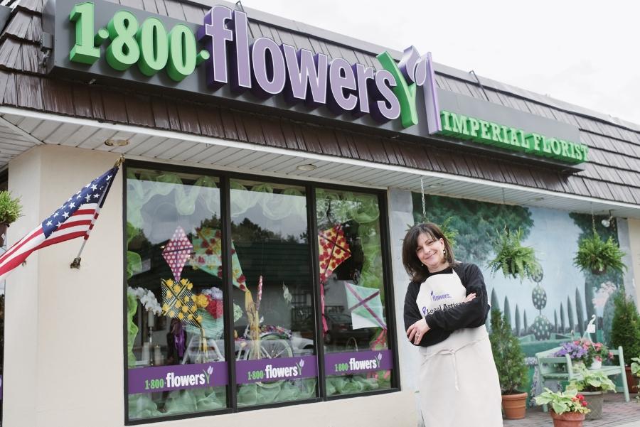 Article Cards Featured Image florist in front of flower shop