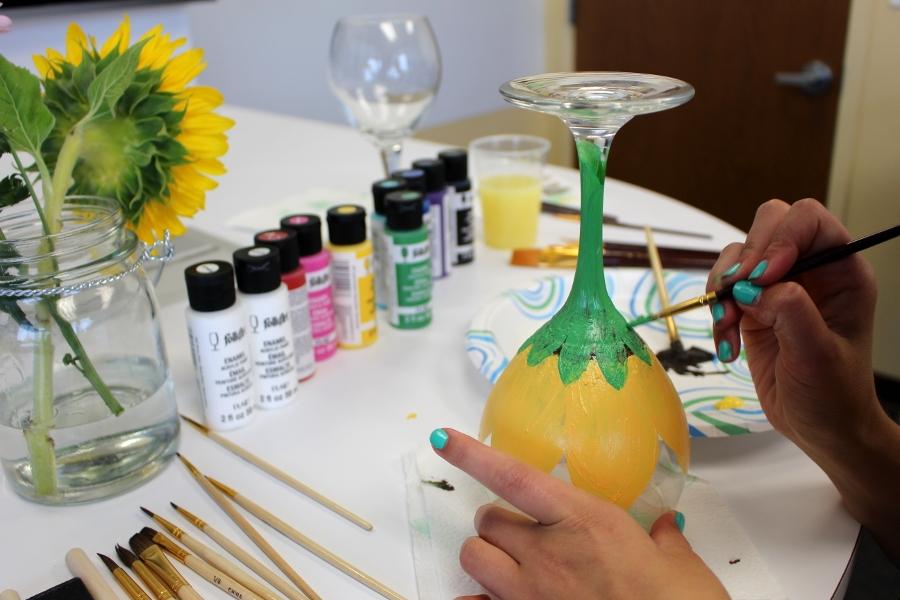 Painting sunflower on wine glass