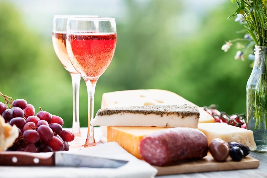 Article Cards Featured Image cheese and wine outdoors in summer, perfect simple meal