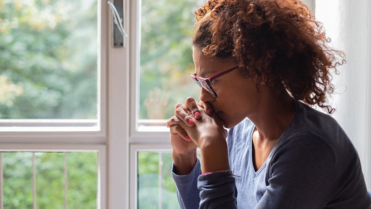 Article Cards Featured Image The importance of remembrance: In this image, a woman remembers a lost loved one.