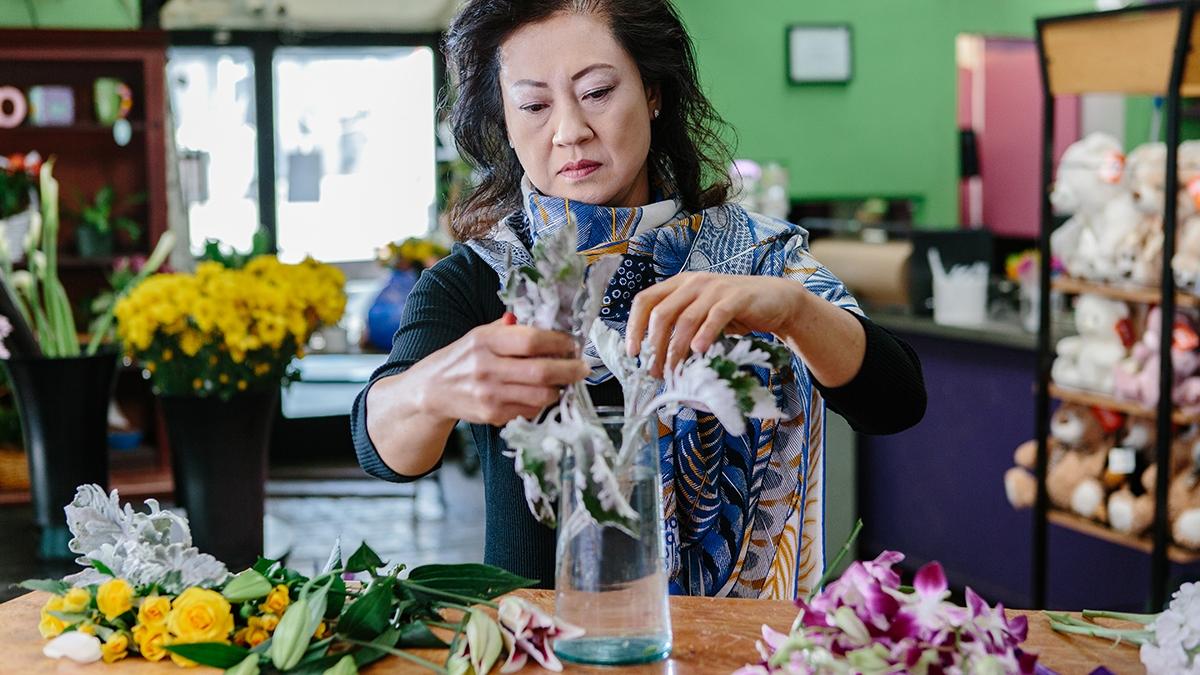 Article Cards Featured Image Local florist Vivian Chang arranges flowers at her Los Angeles area shop