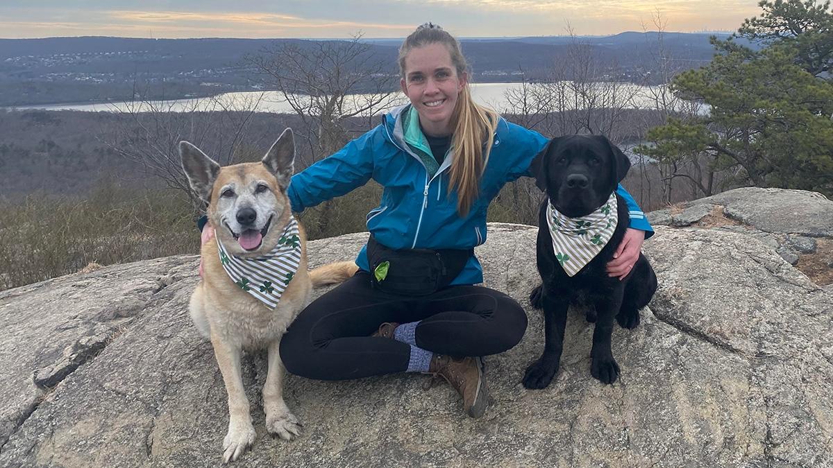 Article Cards Featured Image Photo of Heather Myers, an expert on pet sympathy messages, with her dogs Hope and Sailor.