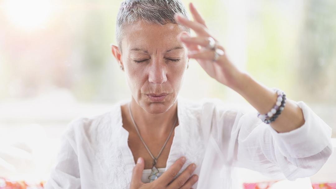 Photo of a woman meditating