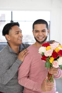 Photo of a couple celebrating their love story despite their long distance relationship.