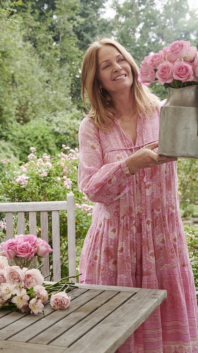 romantic florals with Rachel Ashwell holding jug of flowers