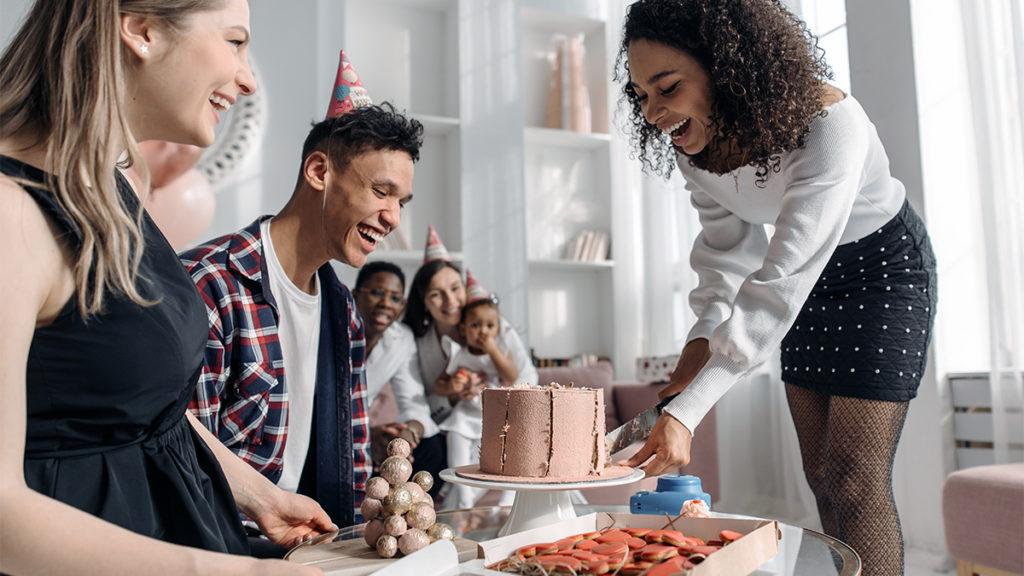 a photo of why every birthday is special: cutting a cake at a birthday party