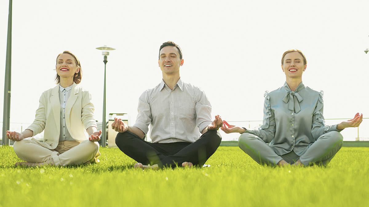 employee engagement activities with co workers doing yoga