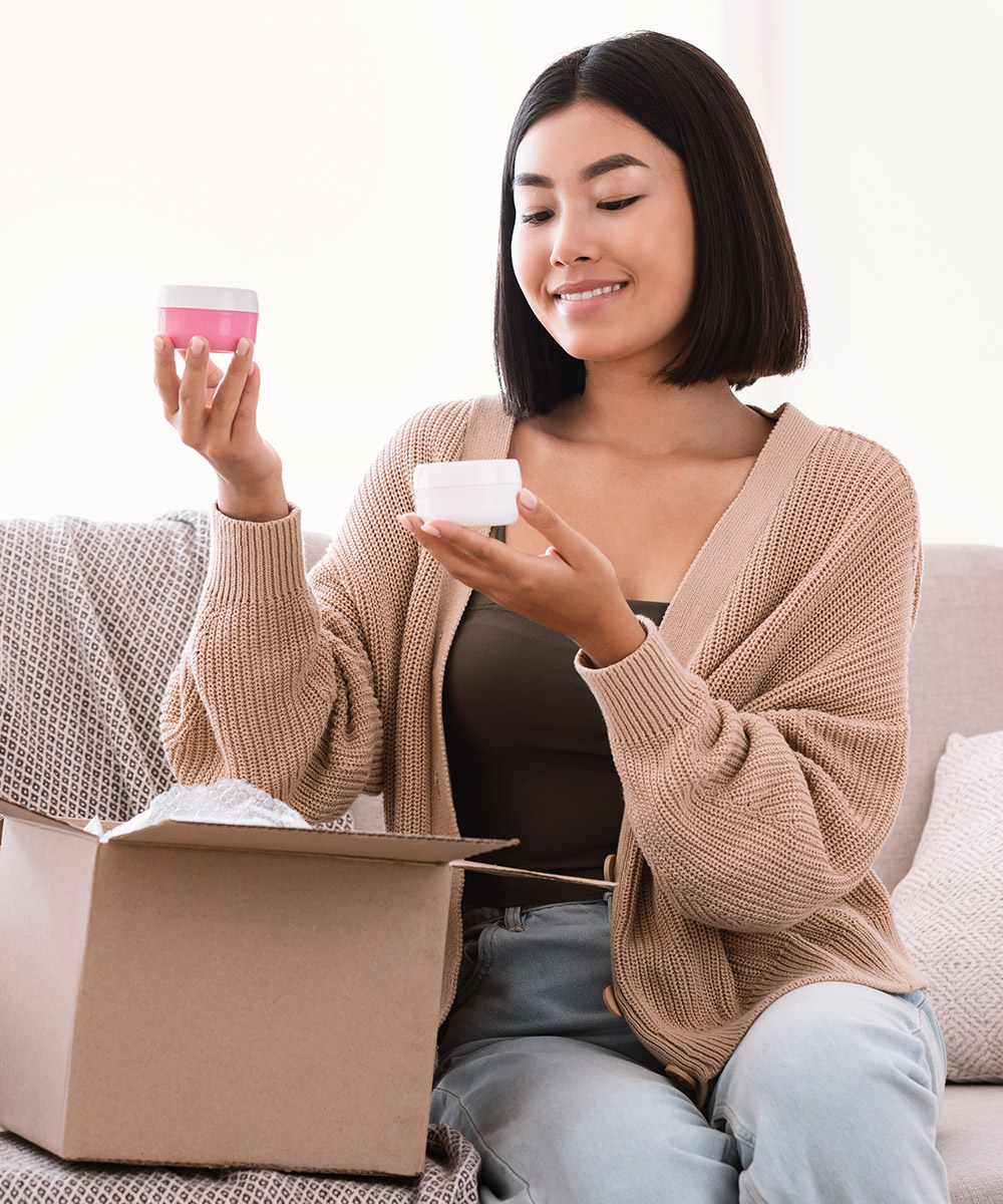 birthday gifts for libra with smiling woman receiving beauty box