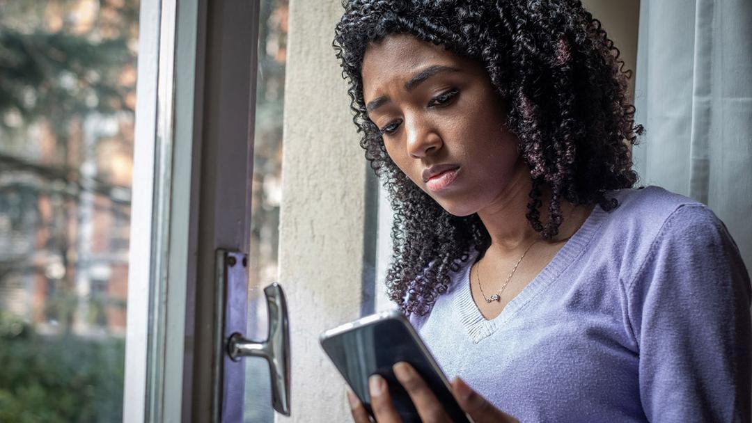 loneliness with woman scrolling social media