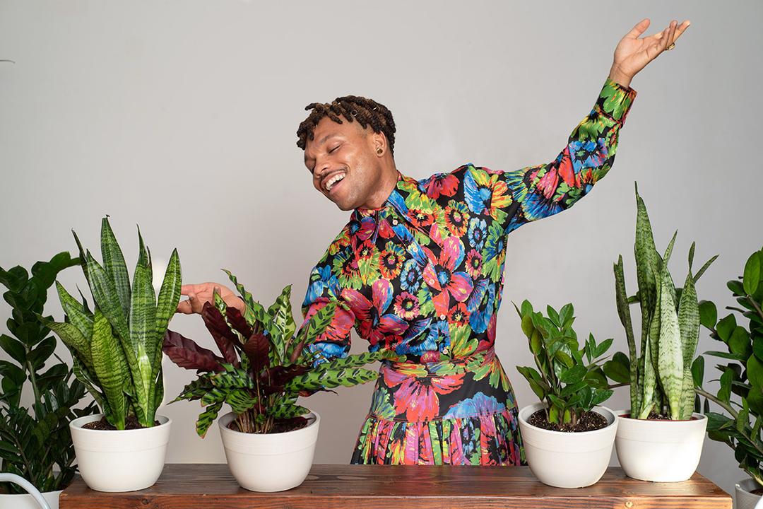 decorating with plants plant kween posing with plants