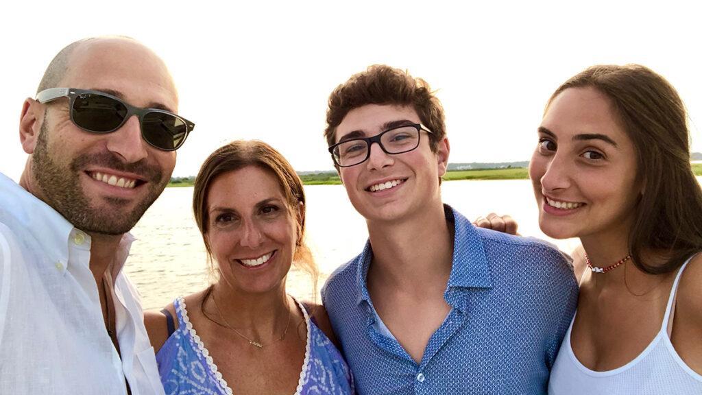 Dina Colombo and family at the beach.